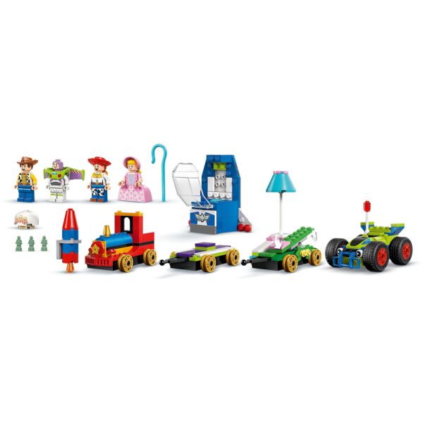 U1058151_6main Конструктор LEGO Disney та Pixar Святкування з Історії іграшок: поїзд та авто для гонок (43264)